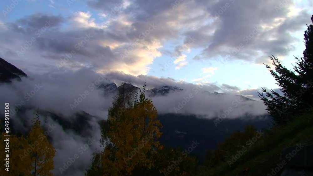Autumn landscape with mountains and clouds - time lapse Autumn landscape with mountains and clouds - time lapse