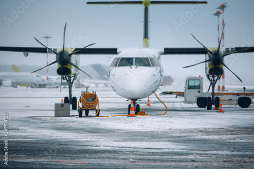 Modern airplane near terminal