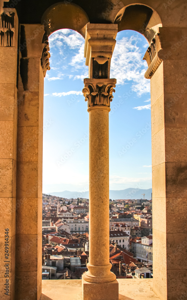 downtown view through gistoric pilar frame. Travel Split Croatia Dalmatia