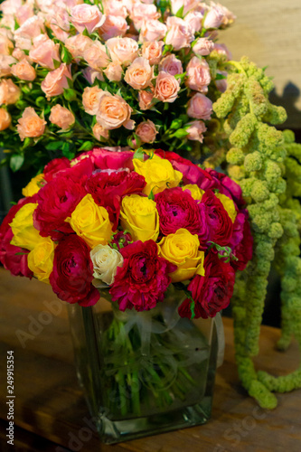 Fototapeta Naklejka Na Ścianę i Meble -  Flowers in vases. Bouquet of roses