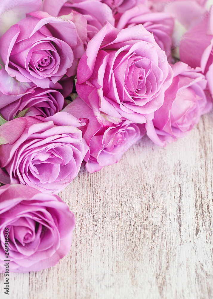 Lovely bunch of flowers .Close-up floral composition with a pink roses .Beautiful fresh pink roses on a table.