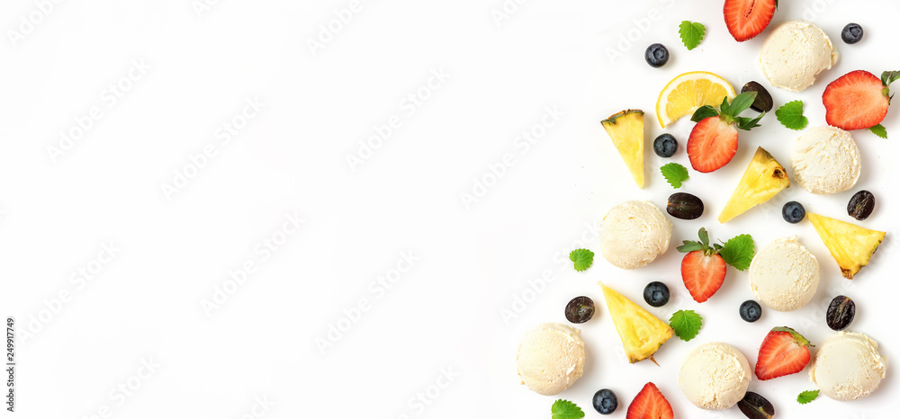 Berries and ice cream balls on white background. Summer concept.