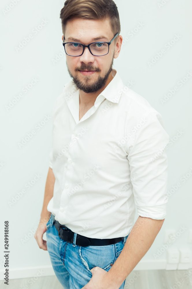 Fototapeta premium Young office worker wearing casual on the grey backround