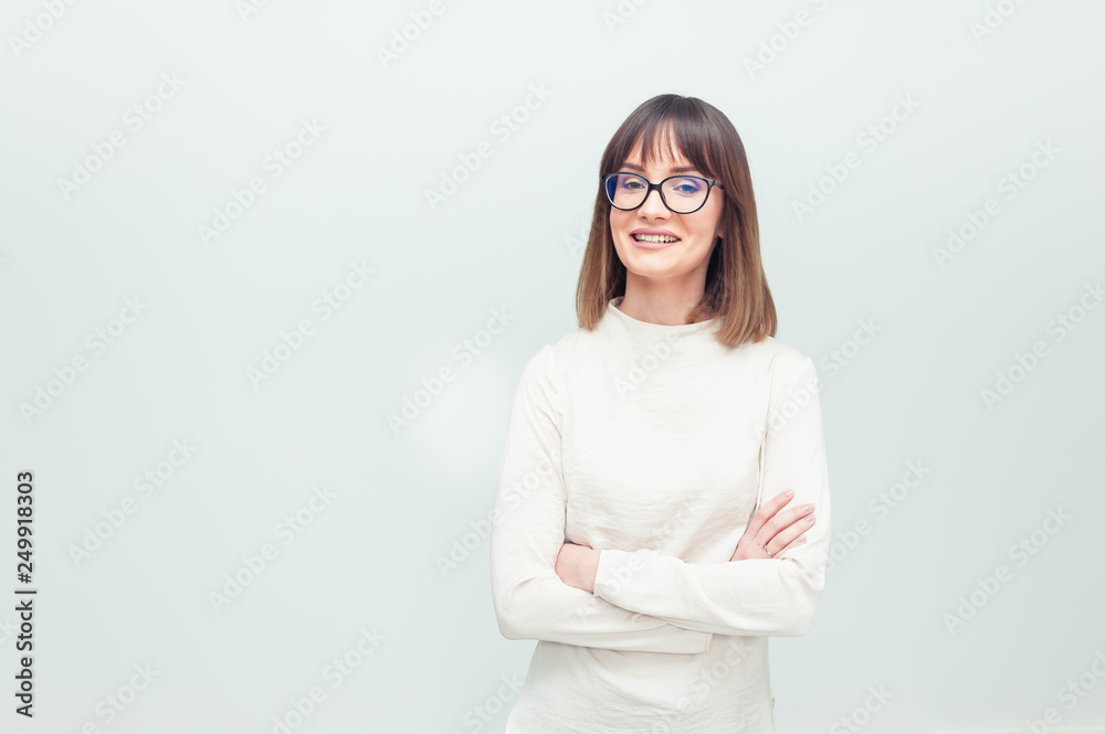Portrait of beautiful woman in eyeglasses in office company Portrait of beautiful woman in eyeglasses in office company