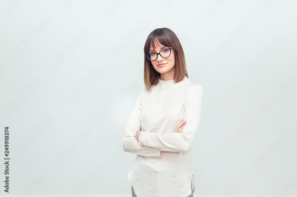 Portrait of beautiful young woman in eyeglasses on white background Portrait of beautiful young woman in eyeglasses on white background