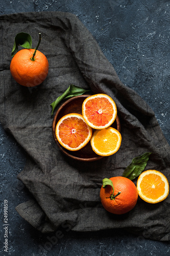 Orange fruits. Ripe Juicy oranges on linen cloth top view. © fedorovacz