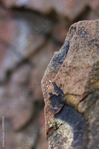 Granite rocks with blurred background. Granite close up. Texture of the stone. Natural material background