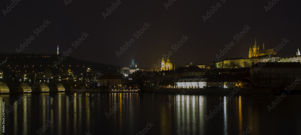 Charles Bridge Tower Bridge river at night Prague