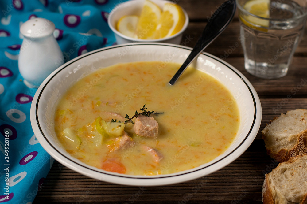 Traditional Finnish salmon cream soup Lohikeitto with potatoes and leeks Traditional Finnish salmon cream soup Lohikeitto with potatoes and leeks