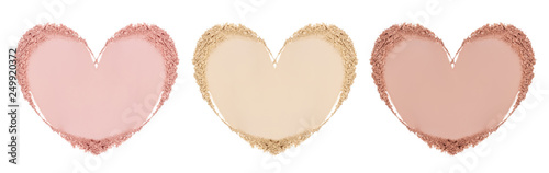 Powder face smears. Smears of foundation for face. Conceptual hearts from powder smears. Isolated on white background