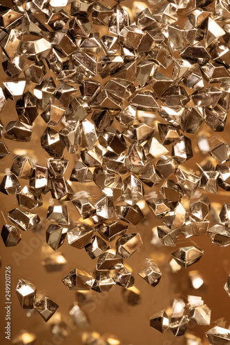 Shiny background. Background of gold particles. New Year, Christmas background for your design.