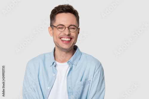 Photography Happy man wearing glasses laughing at joke isolated on background