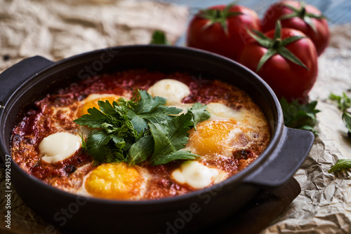 Pan of Fried Eggs with Tomatoes, Sweet Peppers and Coriander