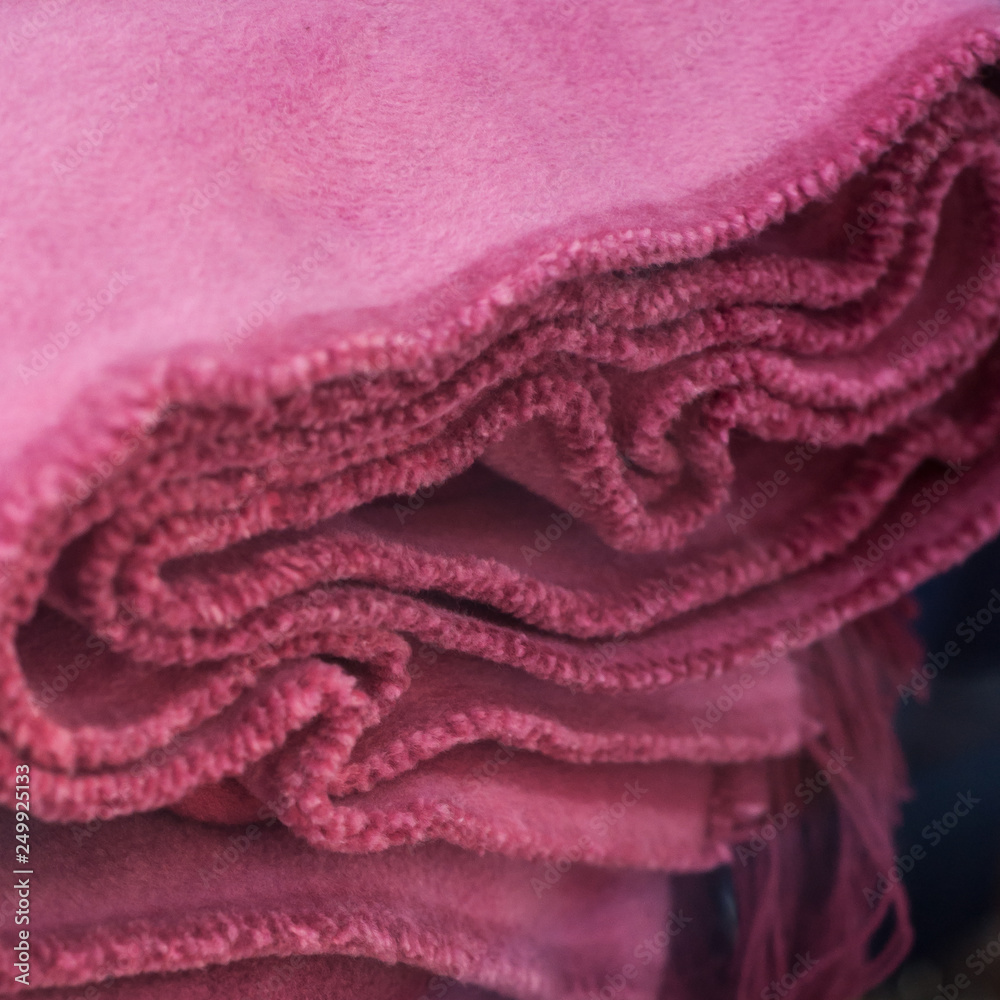 Obraz premium closeup of pink fluffy plaid texture in decoration store