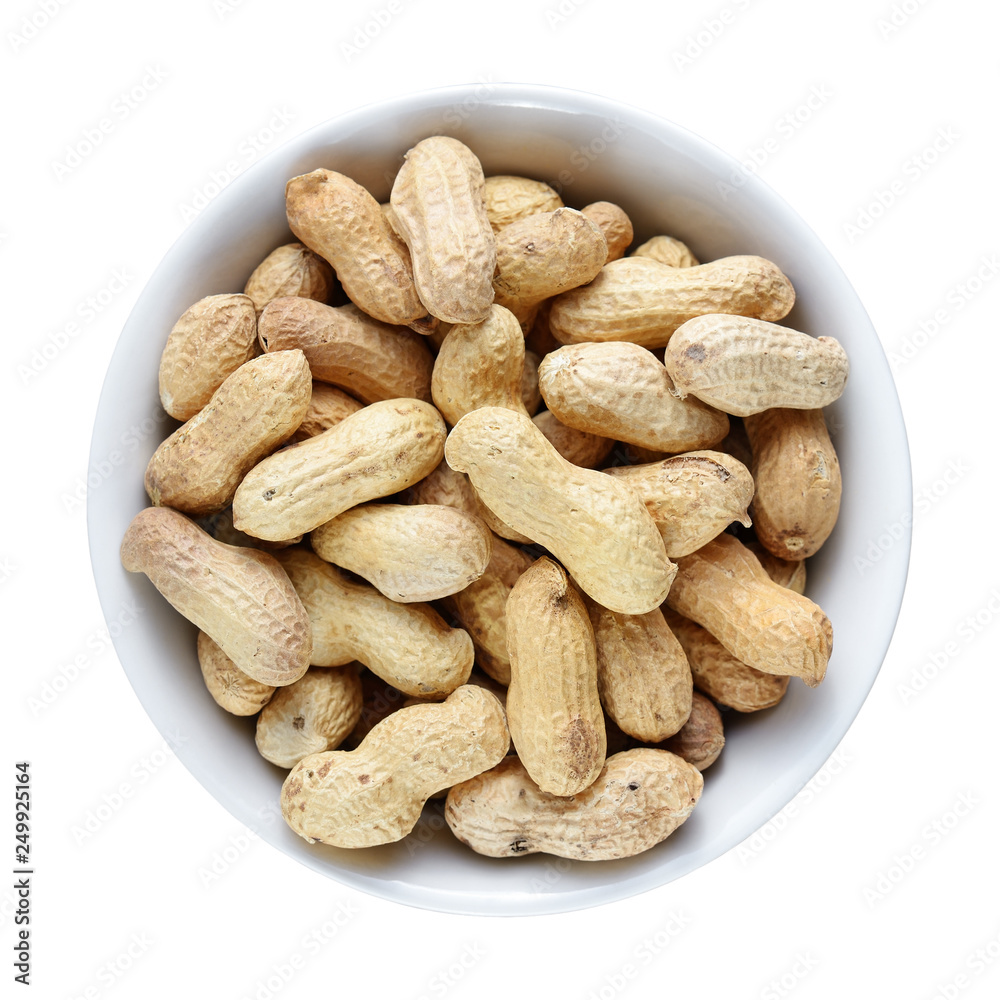 Peanuts in bowl isolated on white background Peanuts in bowl isolated on white background