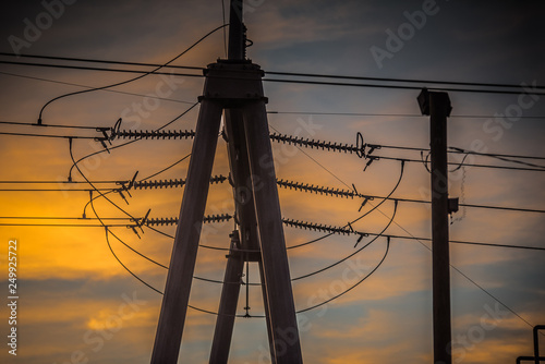 Power lines behind sunset