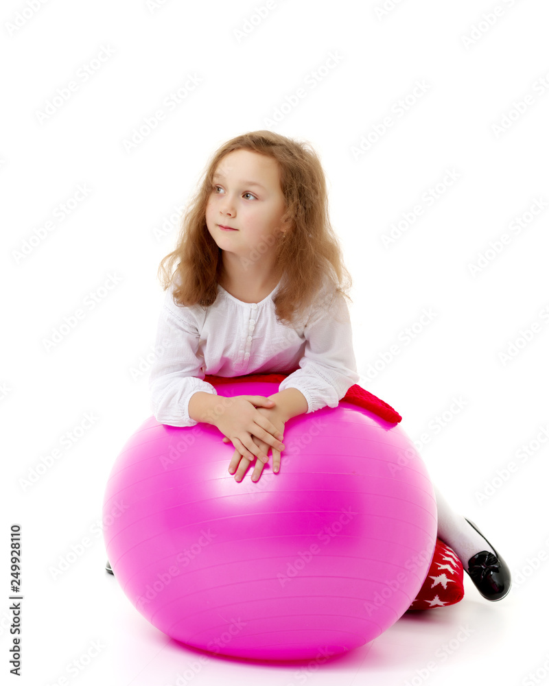 Little girl is playing with a ball Little girl is playing with a ball
