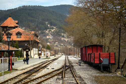 Old railroad station with narrow gauge railway track, popular tourist attraction known as sarganska osmica in Mokra Gora village in Serbia. photo