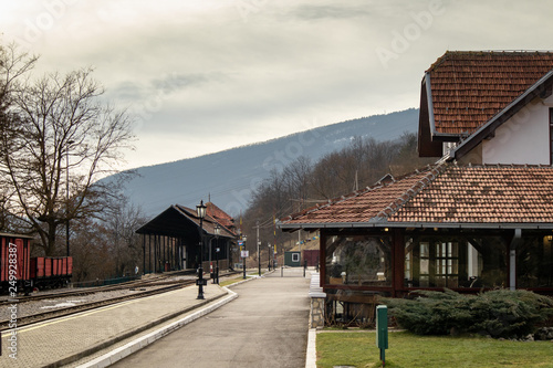 Old railroad station with narrow gauge railway track, popular tourist attraction known as sarganska osmica in Mokra Gora village in Serbia.