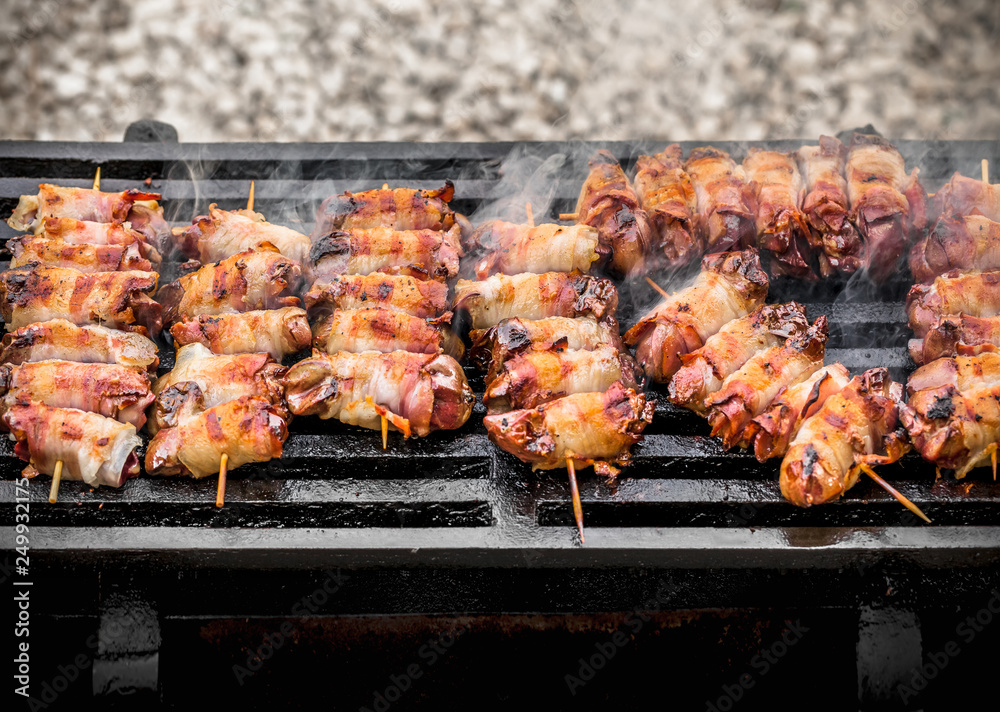 Barbeque outside arrangement grilled pork meat kebabs and smoke