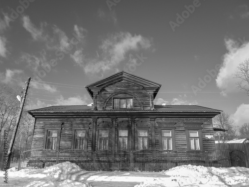 Old wooden house in the city. An old wooden house. © Binkontan