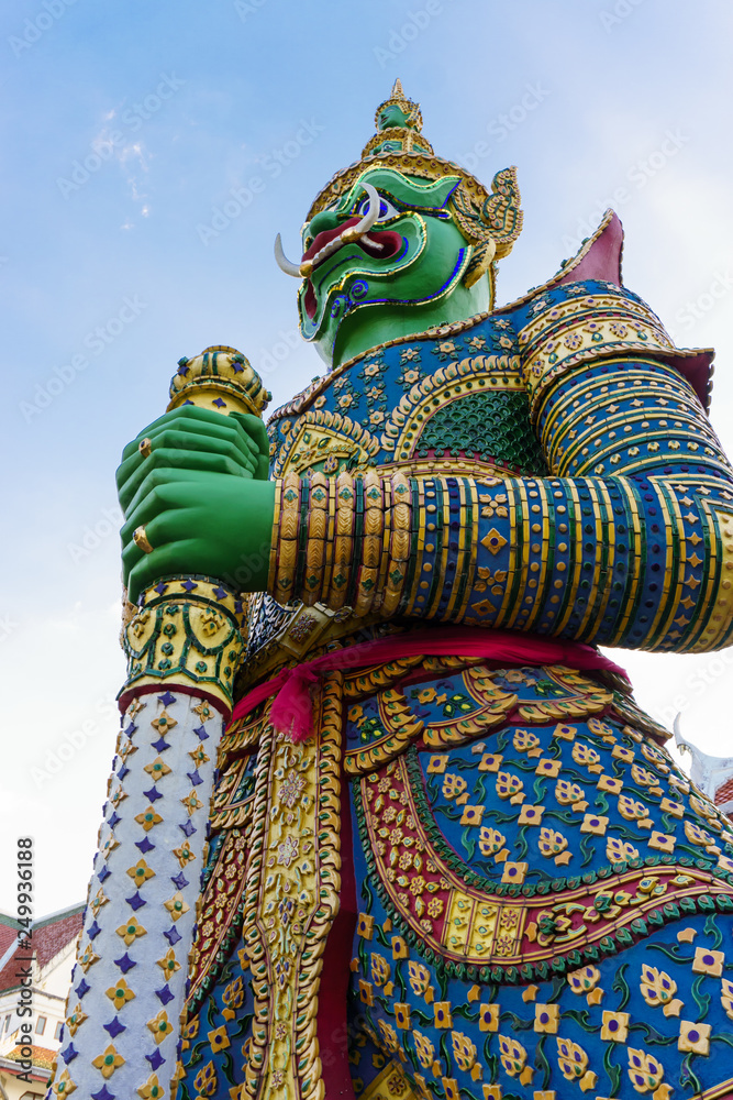 Giant statues guarding the temple entrance in wat arun Giant statues guarding the temple entrance in wat arun