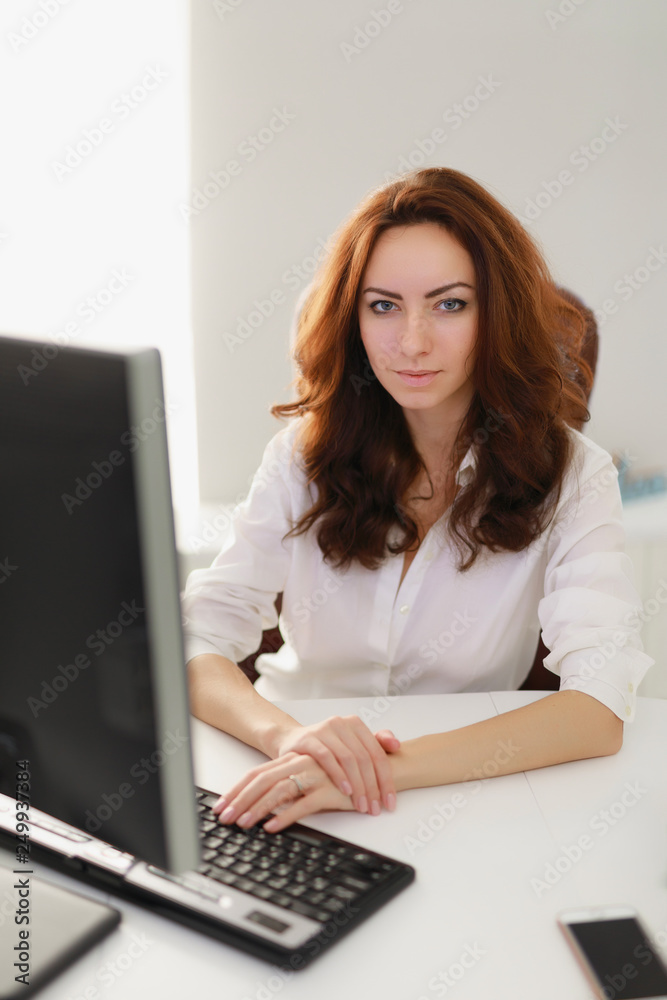 Portrait of beautiful businesswoman working in office Portrait of beautiful businesswoman working in office