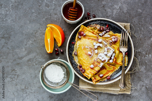Sweet crepes with pomegranate