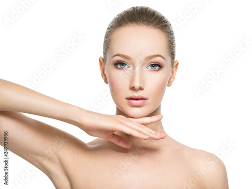 Beautiful face of young woman with perfect health skin