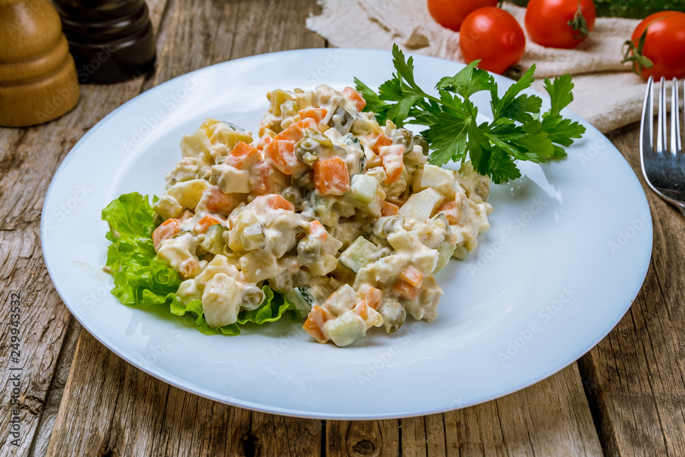 salad olivier on plate salad olivier on plate