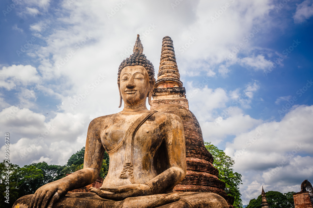 Buddha statue sitting in the Sukhotai Historical Park, Thailand Buddha statue sitting in the Sukhotai Historical Park, Thailand