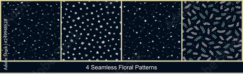 Seamless vector floral patterns with abstract small flowers and leaves in monochrome blue colors on black background. Collection of ditsy prints