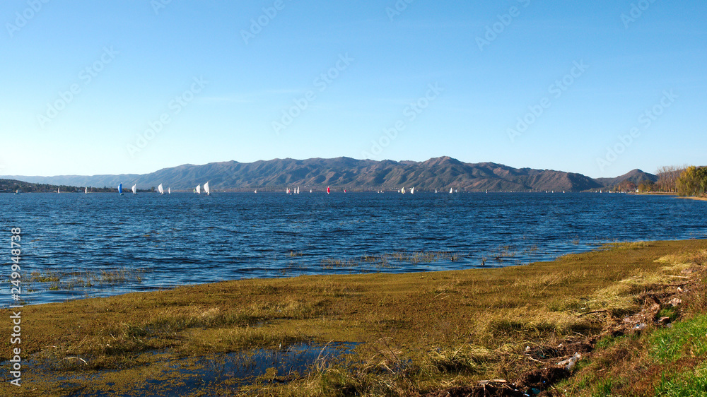Sailboats in San Roque Lake, Villa Carlos Paz, Cordoba, Argentina.