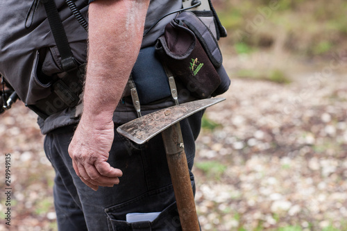 Ballarat Australia June 25th 2014 : Close up view of a prospectors pick axe in a belt holster photo