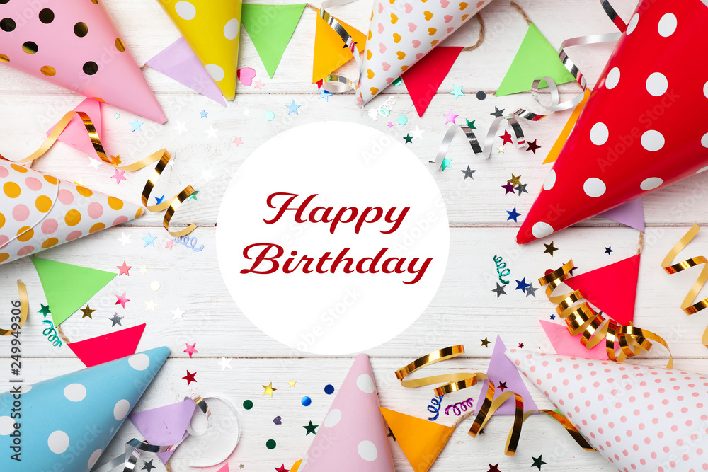 Obraz premium Flat lay composition with birthday party items on wooden background