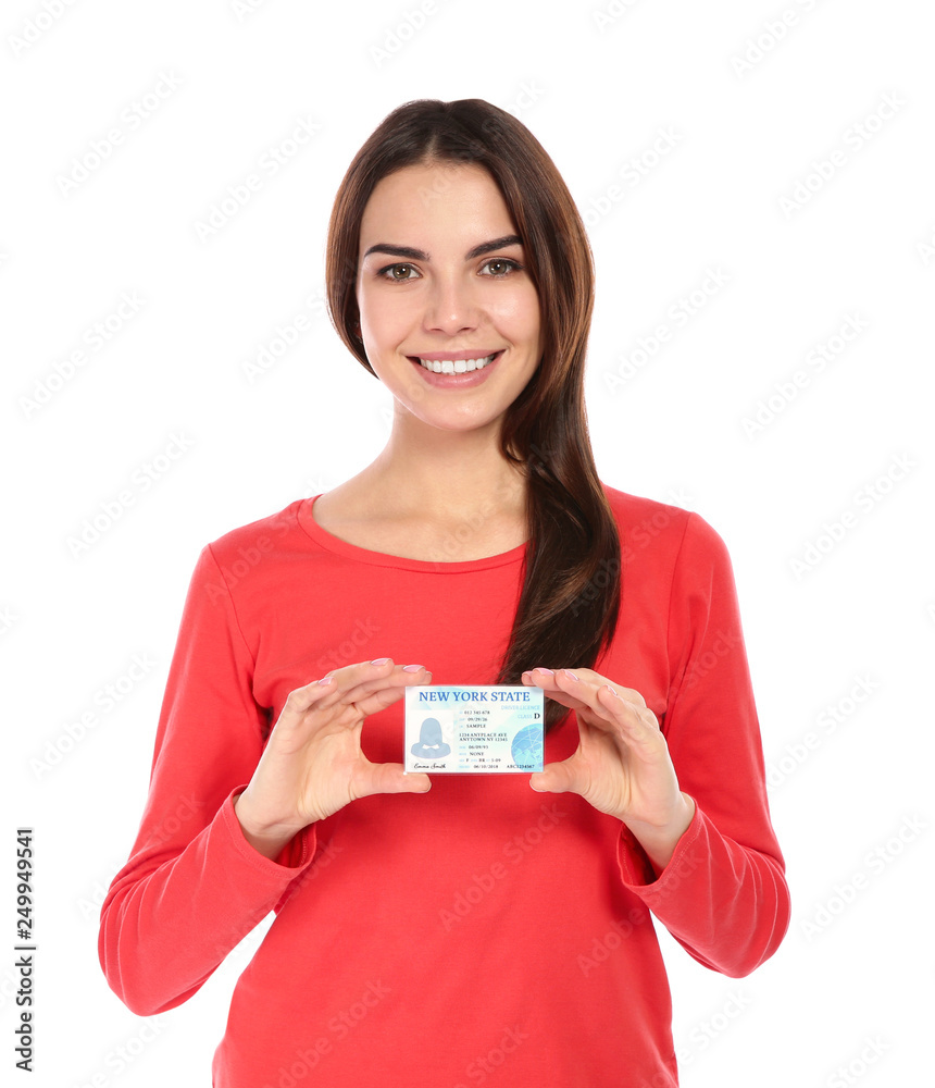 Happy young woman with driving license on white background Happy young woman with driving license on white background