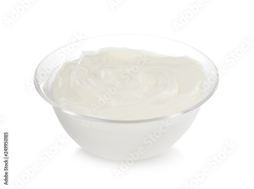 Bowl with sour cream on white background