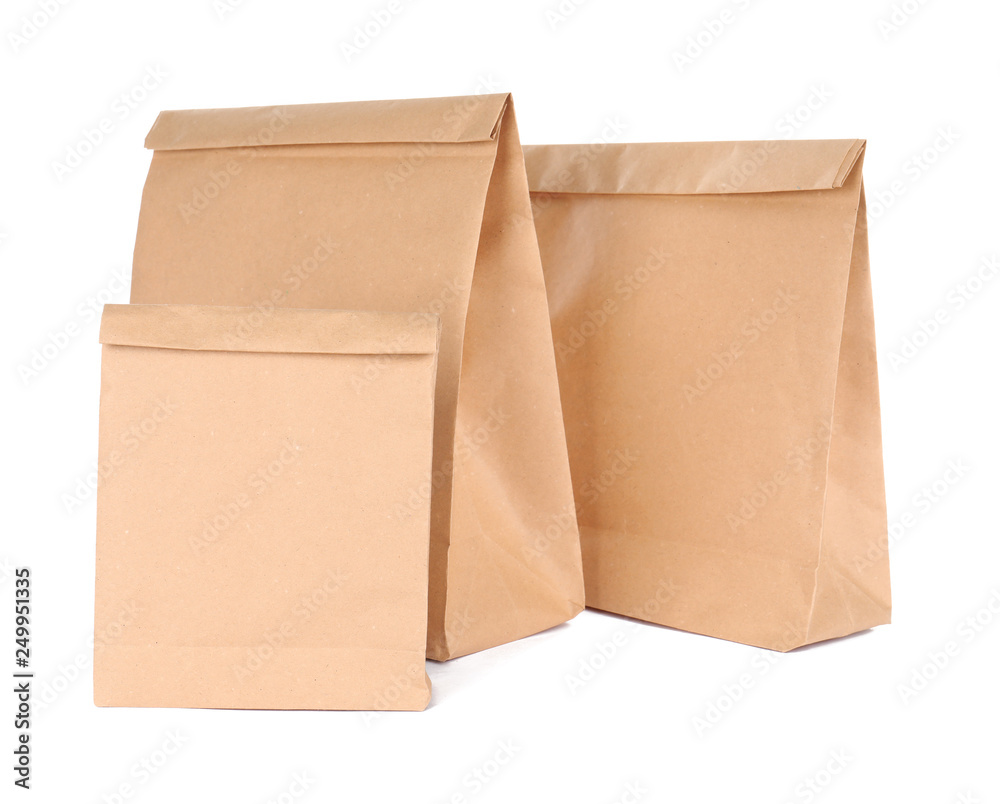 Paper bags isolated on white. Mockup for design Paper bags isolated on white. Mockup for design
