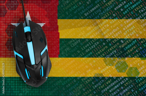 Togo flag  and computer mouse. Digital threat, illegal actions on the Internet photo