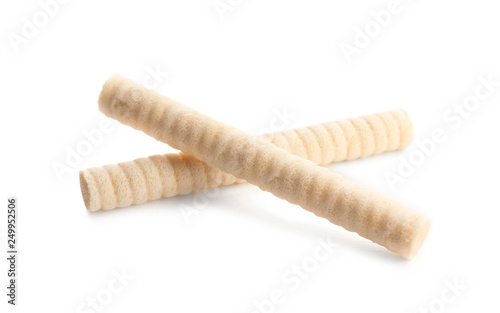 Delicious wafer rolls on white background. Sweet food