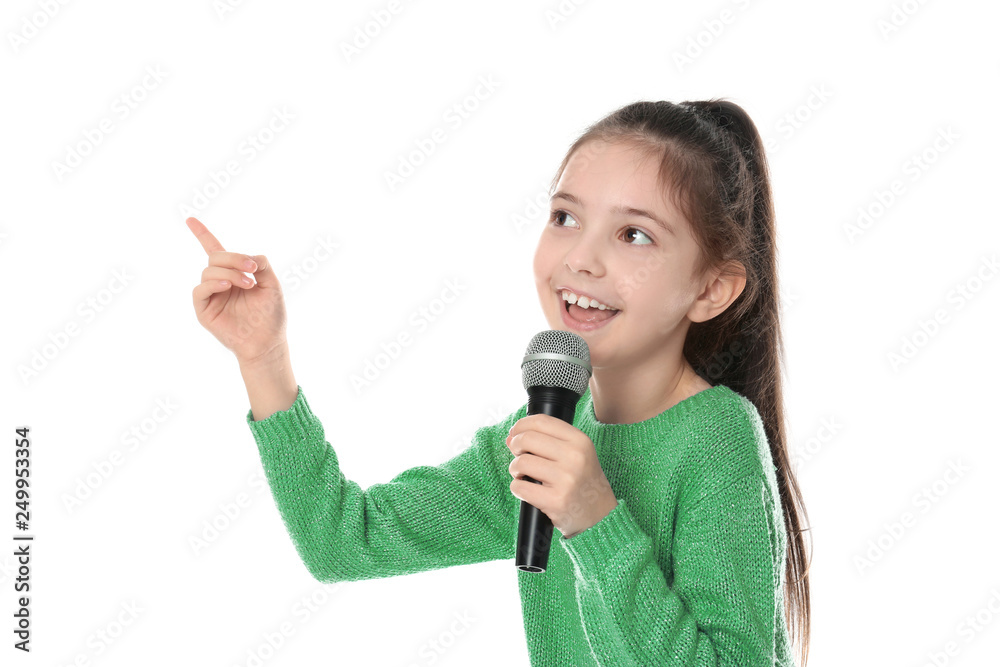 Little girl singing into microphone on white background Little girl singing into microphone on white background