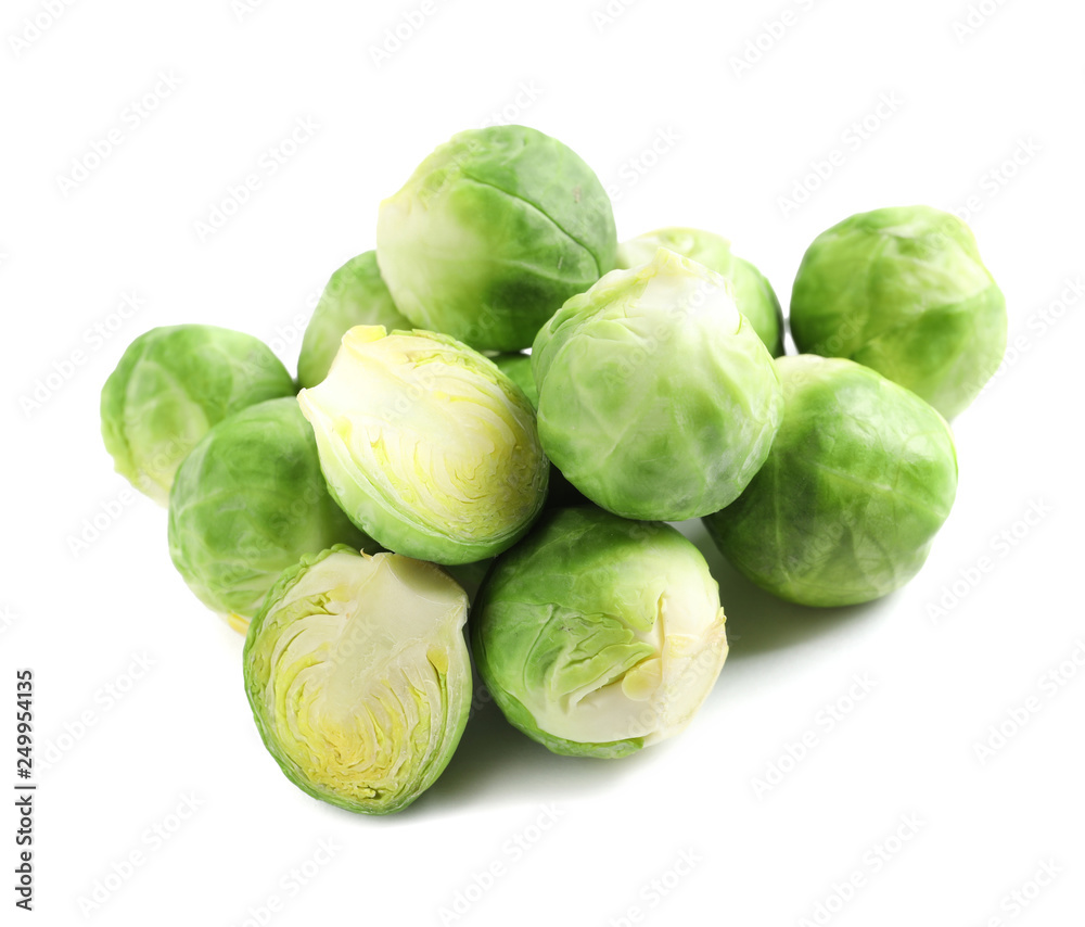 Pile of fresh Brussels sprouts isolated on white Pile of fresh Brussels sprouts isolated on white
