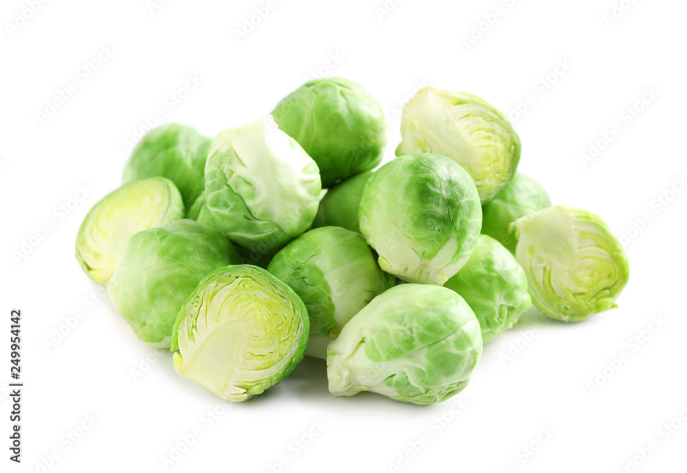 Pile of fresh Brussels sprouts isolated on white Pile of fresh Brussels sprouts isolated on white