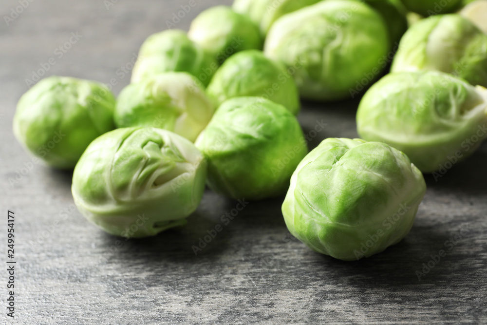 Fresh Brussels sprouts on grey table, closeup Fresh Brussels sprouts on grey table, closeup