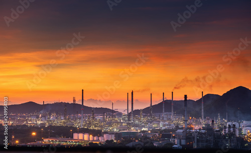 Landscape of Oil and Gas Refinery Manufacturing Plant., Petrochemical or Chemical Distillation Process Buildings., Factory of Power and Energy Industrial at Twilight Sunset., Engineering Petroleum.