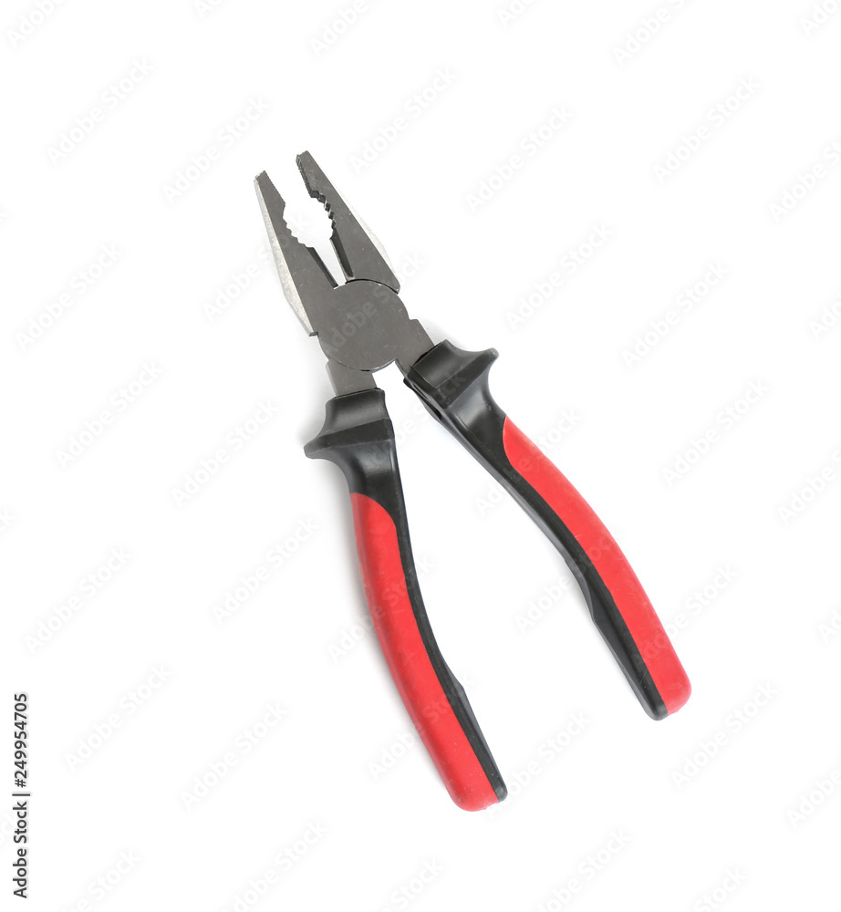 New pliers on white background, top view. Construction tools