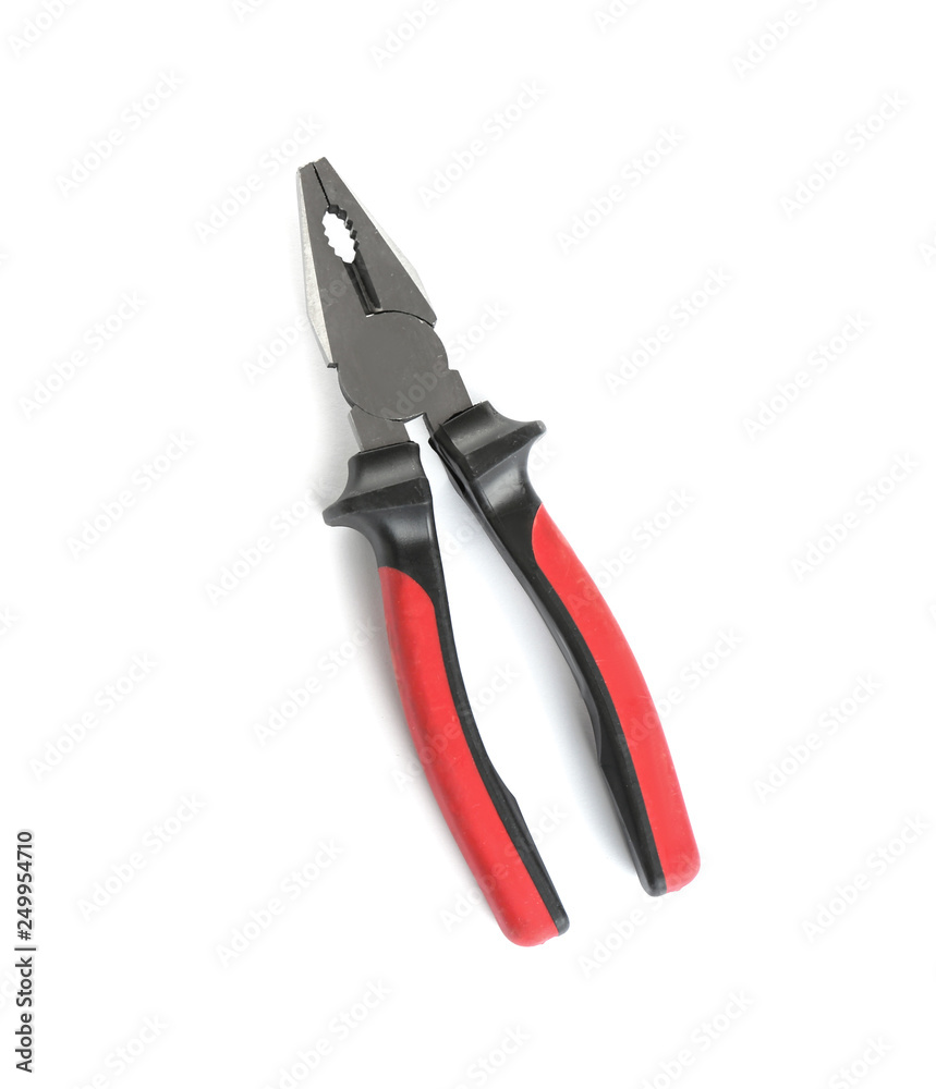 New pliers on white background, top view. Construction tools New pliers on white background, top view. Construction tools