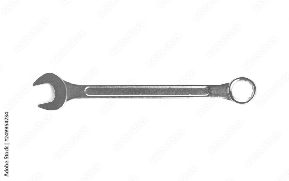 New wrench on white background, top view. Construction tools