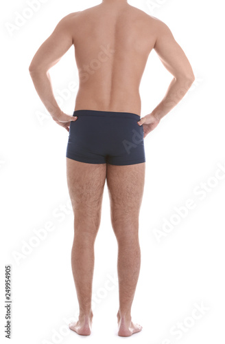 Young athletic man on white background, closeup. Weight loss