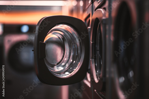 Fotografija Dark laundry room with opened door
